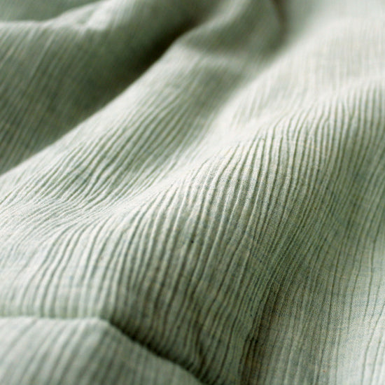 Our carefully selected fabric called "Crespo" is woven with special techniques to make irregular crinkles (Shibo in Japanese) on the surface. Due to this unevenness on the surface, the area where the fabric touches our skin is reduced.